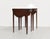 A classic, versatile pair with a clever twist. These mid century traditional side tables feature warm brown wood, tapered...