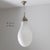Opal glass pendant light, Italian design and product from the 1950s and 1960s. The structure is made of glass and metal...