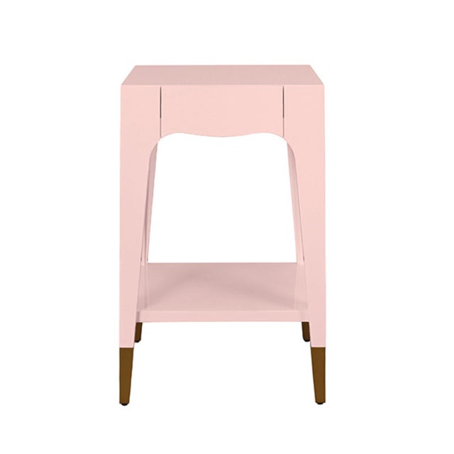 New special order item. Not vintage. Elevate your space with this striking side table featuring clean tapered legs and a...