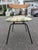 Mid century atomic age chair by Clifford Pascoe. The chair features a bentwood backrest with a wrought iron base....