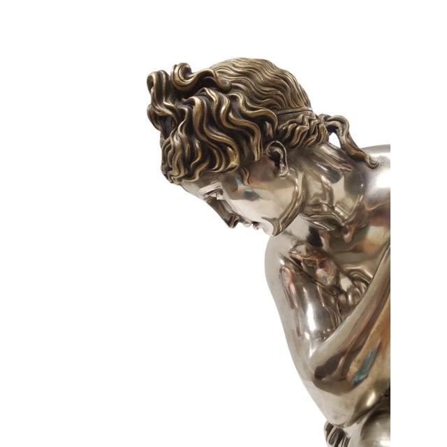This exquisite mid-nineteenth century sculpture features a nude woman in silvered bronze with parcel gilt accents. The...