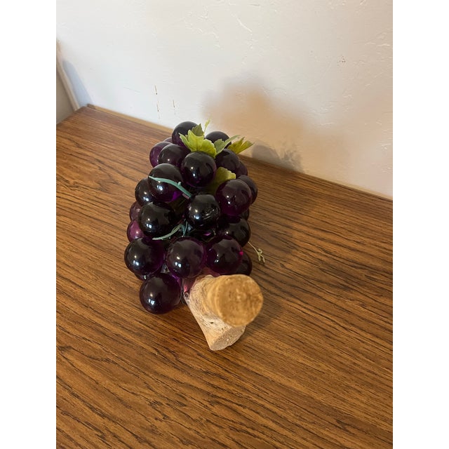 A Mid Century Lucite grape cluster, a highly popular piece of Mid-Century Modern (MCM) home decor from the 1960s. The...