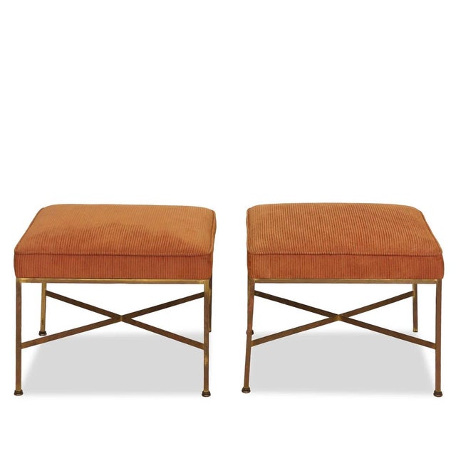 This pair of Paul McCobb ottomans, crafted in the 1950s for Calvin's Directional line, exemplifies the timeless appeal of...