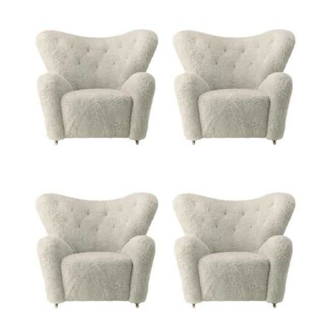 Set of 4 green tea sheepskin the tired man lounge chair by lassen. Dimensions: w 102 x d 87 x h 88 cm materials: sheepskin...