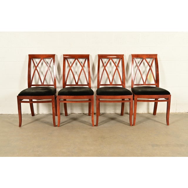 An outstanding set of four Regency or Neoclassical style dining chairs By Bernhardt USA, Circa Late 20th Century Carved...