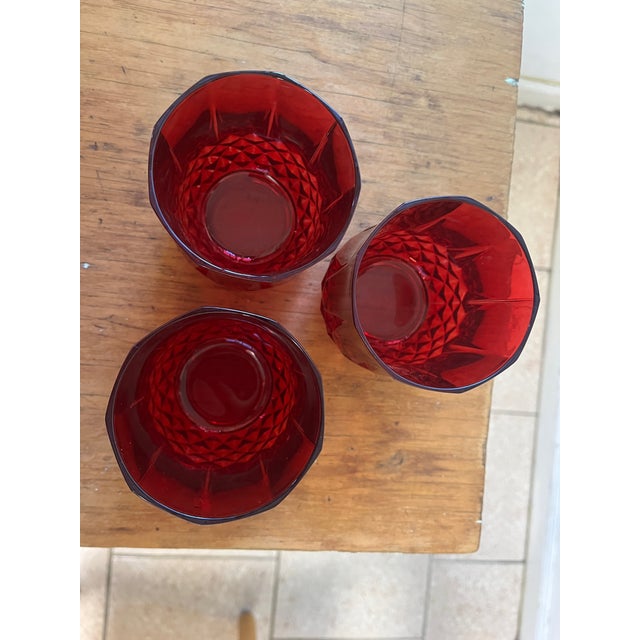 (3) French ruby double old fashioned glasses in the Longchamp (Clear Red) pattern by Cristal D'Arques - Durand. Cut...