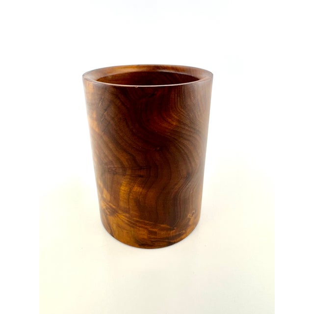 A handsome vintage turned wood pencil and pen holder featuring richly figured grain and warm brown tones. Crafted from a...