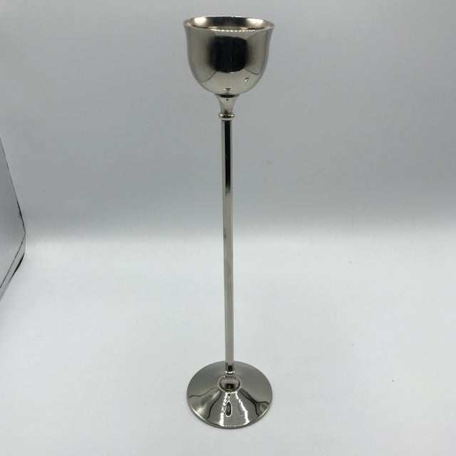 Simplicity is the name for this pair pair of Adams silver plated candle holders. These candle holders are unique with...