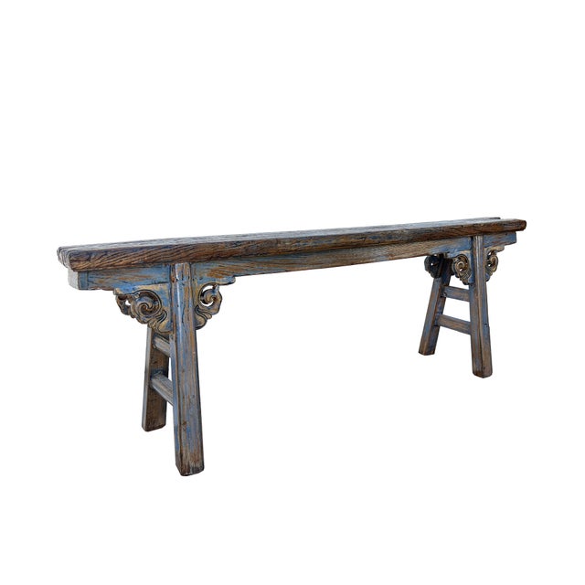 This rustic wooden bench exudes a timeless charm, blending traditional craftsmanship with a weathered, vintage aesthetic....