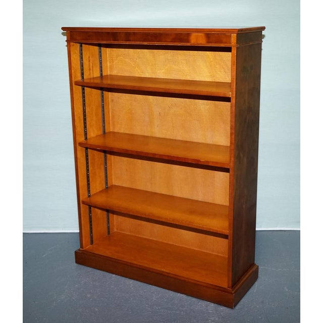 This classic vintage bookshelf features a timeless design with a yew finish and clean, traditional lines. The piece...