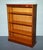 This classic vintage bookshelf features a timeless design with a yew finish and clean, traditional lines. The piece...