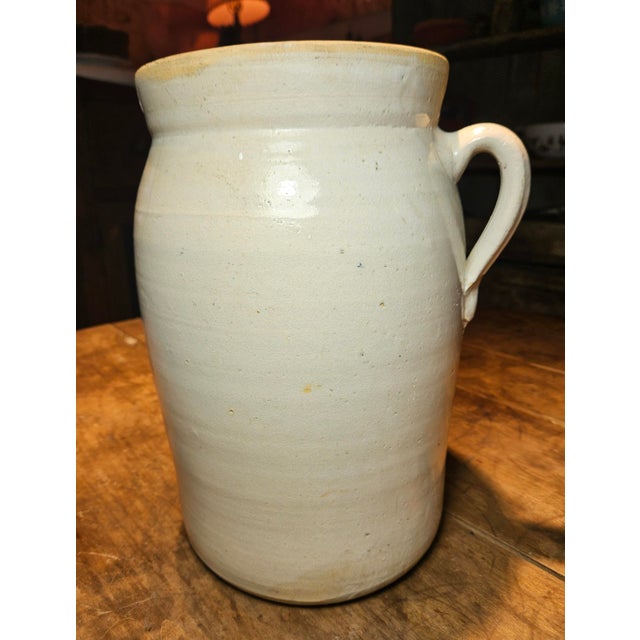 This French stoneware crock, also known as a confit pot or storage jar, is a lovely example of French provincial style....