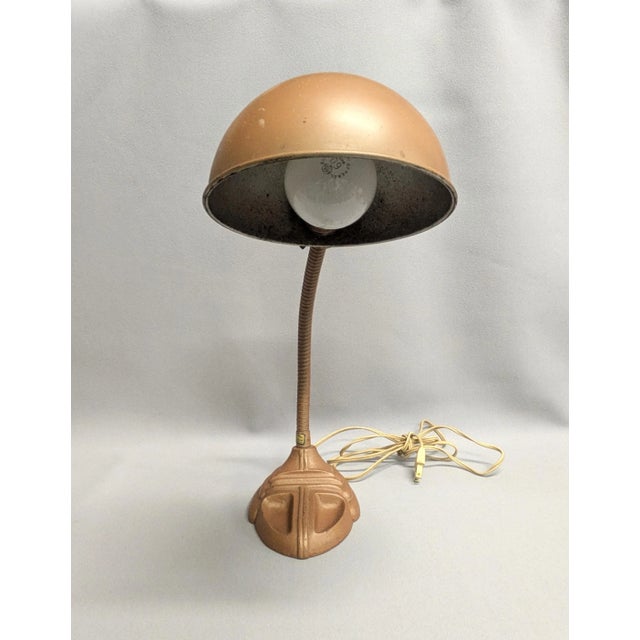 A vintage Rodale gooseneck desk lamp from the 1930/40s. The lamp base is cast iron in the art deco style and has a unique...