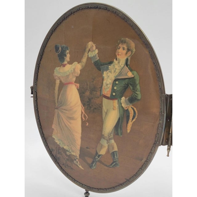 This rare 1800's Victorian bronze frame dancing couple triple hanging shaving vanity is a unique and stylish addition to...