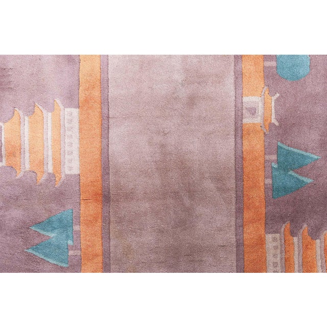This captivating vintage Chinese Art Deco rug, dating back to the 1940s, is a remarkable example of East-meets-West...