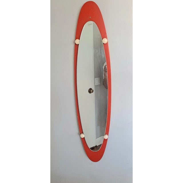 Franco Campo Tick wood mirror. Panted in Orange color. Mirror frame can be restored