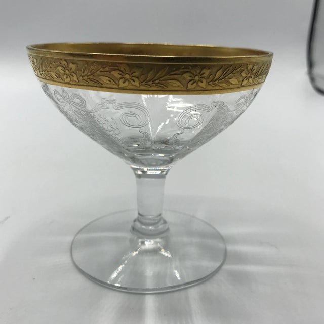 Beautiful Tiffin Rambling Rose cocktail glasses with gold floral etching.