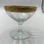 Beautiful Tiffin Rambling Rose cocktail glasses with gold floral etching.