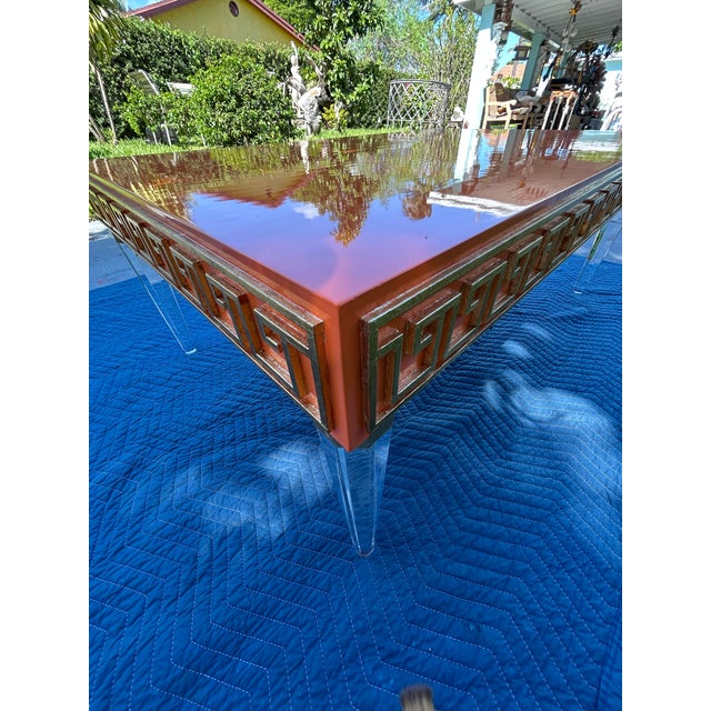 Mid-Century Modern Style High-Gloss Orange Lacquered Wood and Lucite Greek Key Coffee Table by Julio Jimenez For Sale - Image 16 of 17