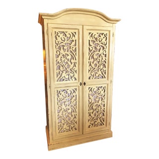Late 20th Century Armoire With Carved Birds and Scroll Designs For Sale