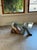 Sculptural “sleeping cowboy” coffee table with glass top. 1970s style. Bold form with a strong pop art/western influence....
