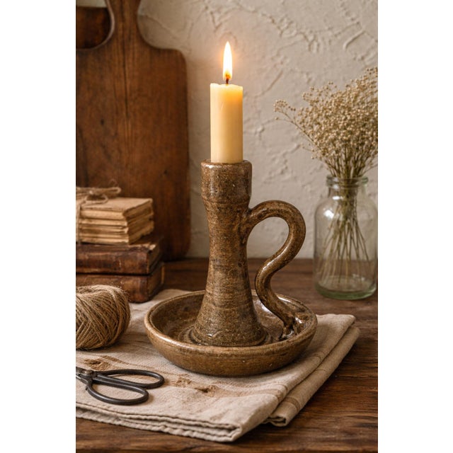 A beautifully handcrafted studio pottery chamberstick by noted Southern folk potter John Meaders of Georgia. This piece...