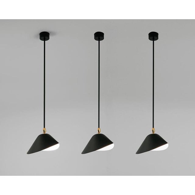 Ceiling lamp model 'bibliothèque ceiling lamp' designed by serge mouille in 1953. manufactured by editions serge mouille...