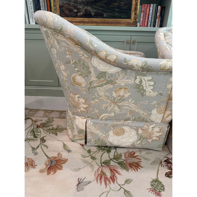 An elegant pair of vintage channel-back club chairs that effortlessly blend timeless craftsmanship with fresh designer...