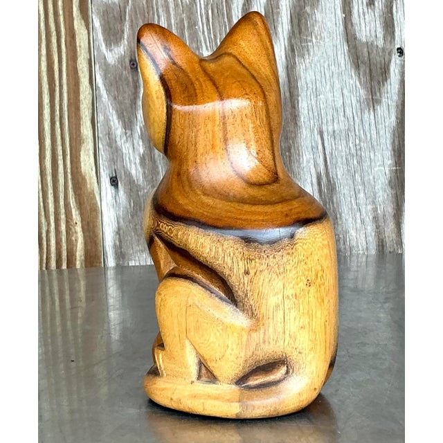Add a charming and whimsical touch to your space with this vintage carved cat figurine. Handcrafted with intricate...