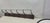 Brown 1920s Vintage Cast and Wood Wall Hanging Coat Hat Rack Store Display For Sale - Image 8 of 8