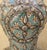 Made in Fez, Morocco, this incredible hand painted metal vase is adorned with resin dots, giving it a very exotic look,...