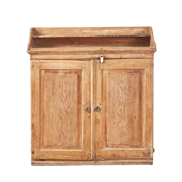 Charming two door late C18th Swedish buffet with reeded front & two interior drawers This piece is designed in the style...