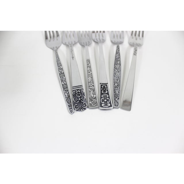 You will get the exact forks pictured. Curated vintage mismatched set of six mid century modern stainless steel dinner...