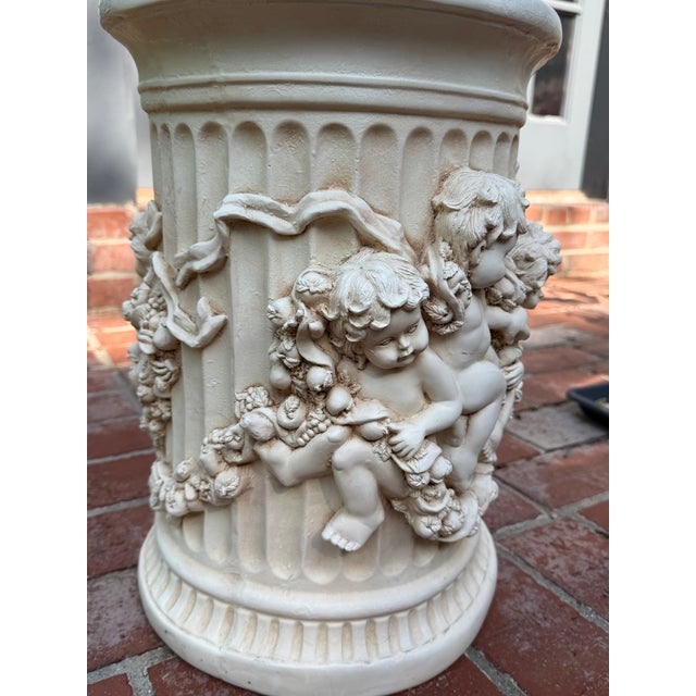This is an attractive, decorative round Corninthian-style column standing 16 inches tall and with a diameter of 11 inches...