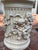 This is an attractive, decorative round Corninthian-style column standing 16 inches tall and with a diameter of 11 inches...