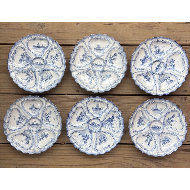 An exceptional and increasingly difficult-to-find complete set of twelve matching oyster plates by Weimar Germany....