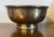Antique 18th century Dutch brass footed fruit bowl. Heavy weight with concentric hand chased lines at the rim and foot....