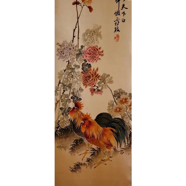 1940-50s Chinese silk embroidered scroll of a rooster and a hen amongst flowers.. The satin stitch and numerous colored...