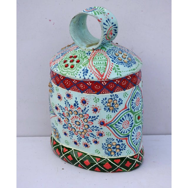 The bell is made of iron and coated primarily with copper, along with a few other metals. They are made from scrap iron...