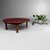 A low Japanese table with a warm wooden top and a simple, balanced form. Dimensions: height 26 cm, diameter 71 cm. A...