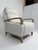 This is a beautiful modern pushback recliner upholstered in an ivory textured fabric that feels soft, clean and elevated....