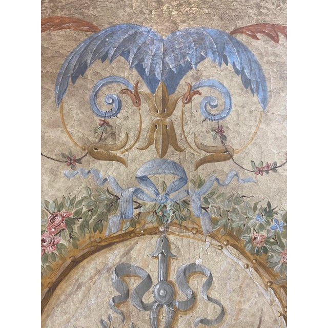 Beautiful Florentine oil on canvas painting, featuring center medallion with mask and violin, floral swags throughout,...