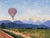 A gentle landscape with a hot air balloon painted by Carla Christ. Framed in gold gilt wood it measures 16 x 18 (9 x12...