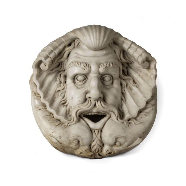 A substantial marble mascherone, executed in a large format characteristic of early 19th-century reinterpretations of...