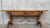 19th century Spanish bench or low console table with carved lye legs in two side of both legs. Original iron pull hardware...