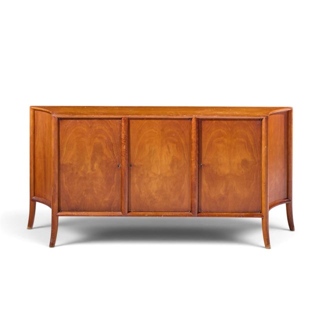 Robsjohn Gibbings for Widdicomb Mid Century Walnut Credenza This credenza measures: 68.25 wide x 16.5 deep x 32 inches...