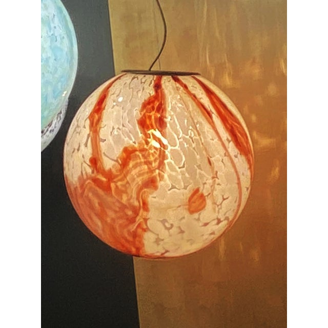 Impressive scenographic transparent with milky-white spot and and venied of brown for this Sphere in Murano Glass.Italian...