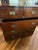 Handsome old campaign chest. Lovely worn wood and hardware. 5 drawers (2 over 3). Top drawers separate from bottom 2...
