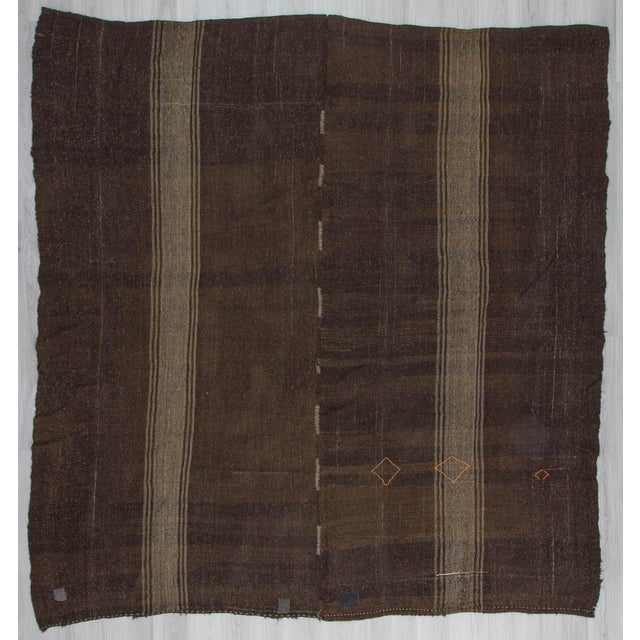 Vintage square kilim rug from Afyon region of Turkey. In good condition. Approximately 55-65 years old.