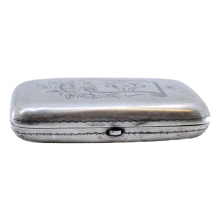 Silver Cigarette Case with Embossed Applications on the Lid and Gold Interior For Sale